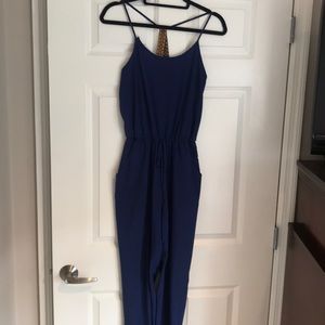 Cutest jumpsuit with embroidered back detail